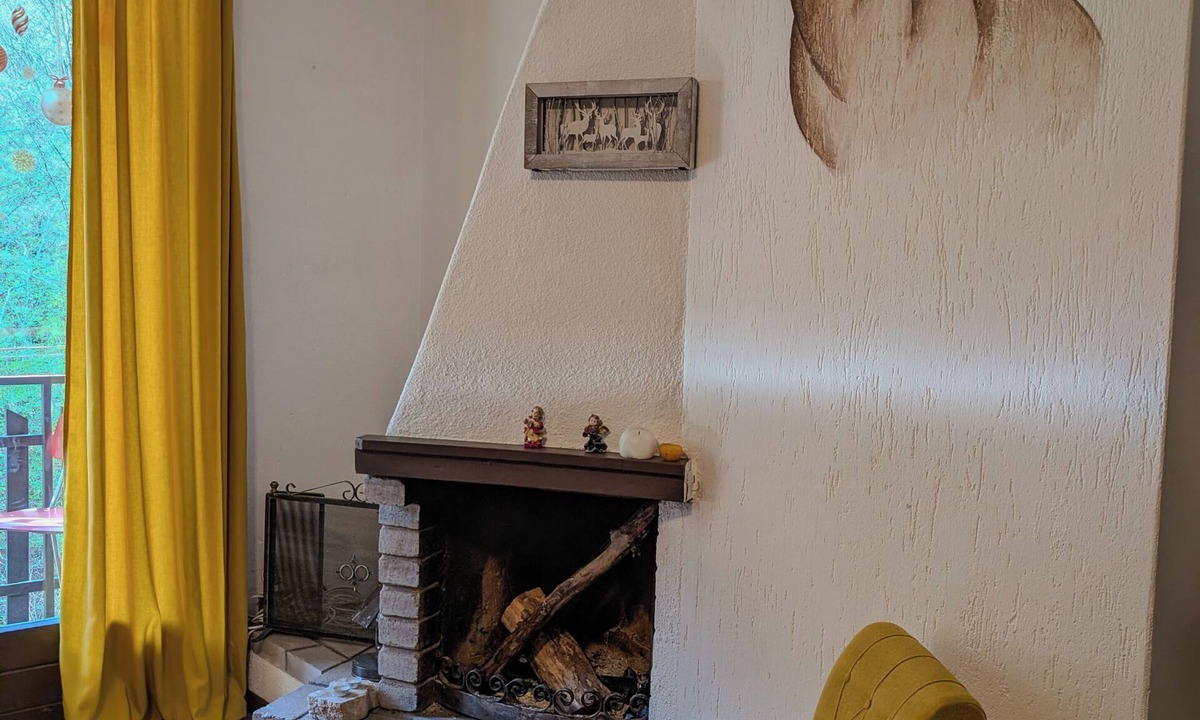 Oltre il Colle Apartment | AlpenDeer: Mountain Charm with Fireplace & View in Oltre il Colle