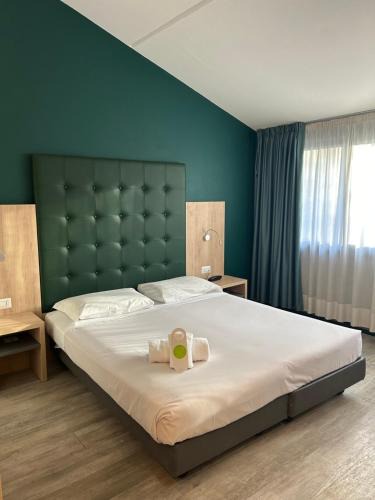 Corgeno Hotel | Green Hotel