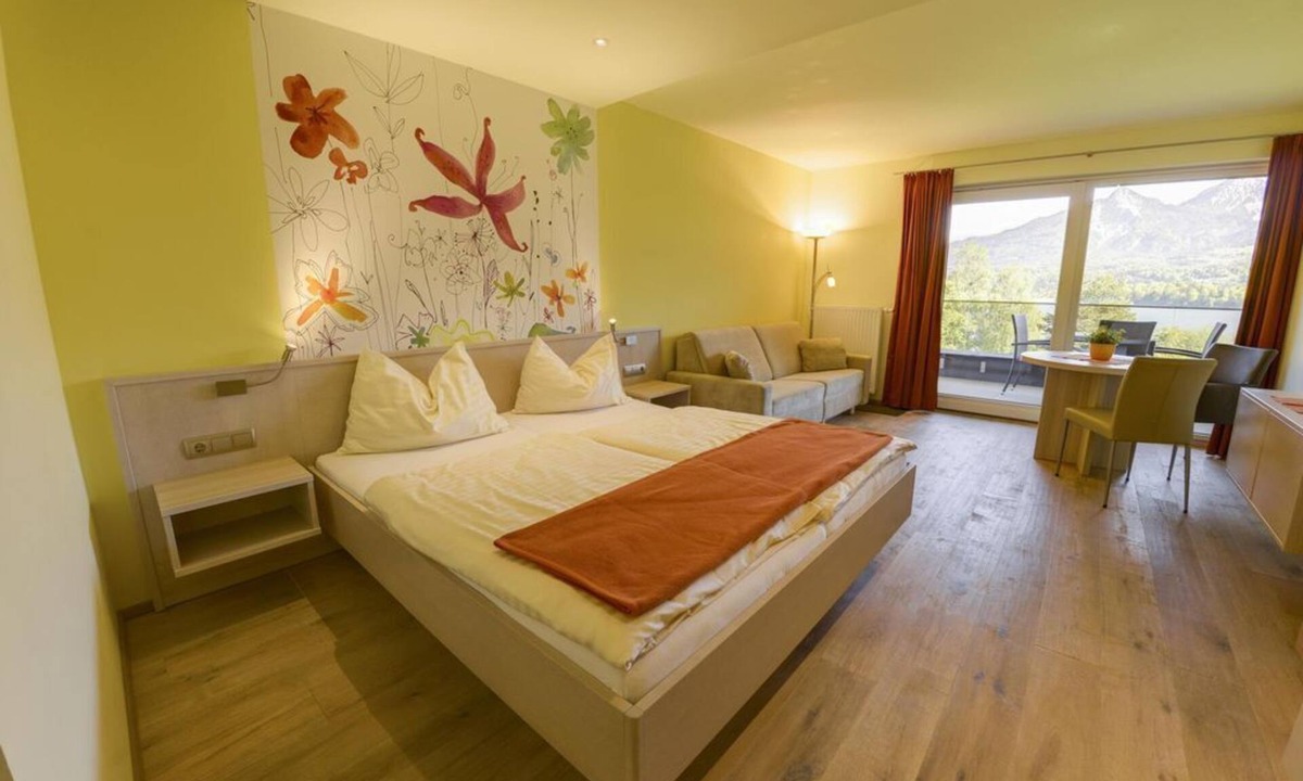 Drobollach am Faakersee House | Junior Suite mit Seeblick Typ A1 - Seepark Drobollach