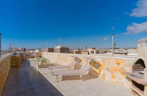 Torre Lapillo Apartment | Apartment 'Due Passi Dal Mare' with Sea View, Shared Terrace and Air Conditioning