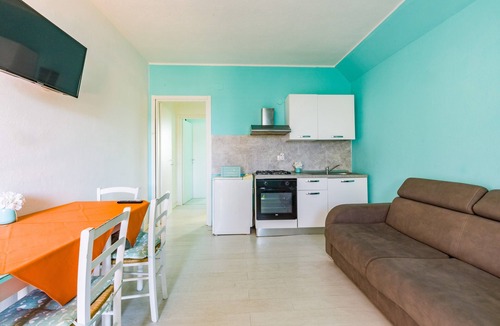 Patti Apartment | Apartment 'La Risacca Suite' with Sea View, Private Terrace and Air Conditioning
