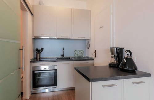 Susello Apartment | Attractive studio with balcony, pool and dream view