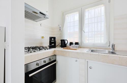 Focene Apartment | Azure Oasis with parking near the airport & beach