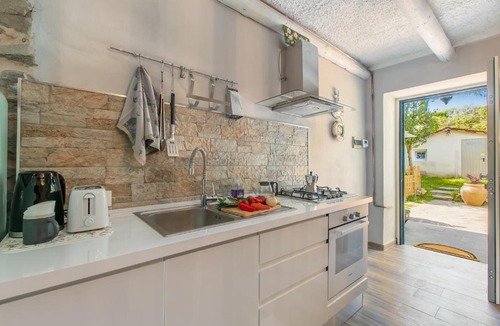 Angera Apartment | Dimora Della Rocca Private Garden - Happy Rentals