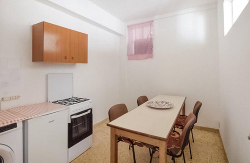 Bianco Apartment | Enjoy sunny days by the crystal-clear sea in this apartment just a few steps from the beach.