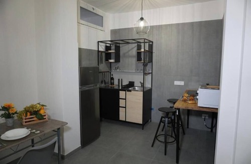 San Nicola La Strada Apartment | Farina Rooms & Apartments - Relaxation and Comfort with City View