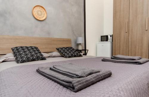 Lazzaretto Apartment | Grey Room