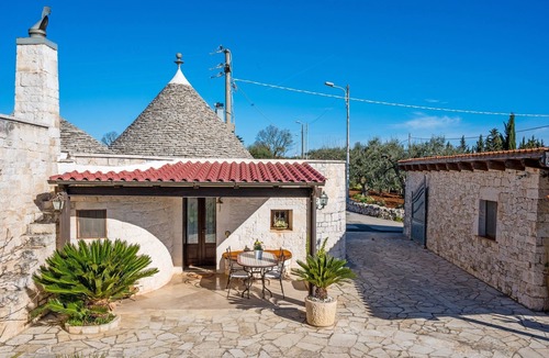 Coreggia Villa | Historic trulli surrounded by ancient olive trees