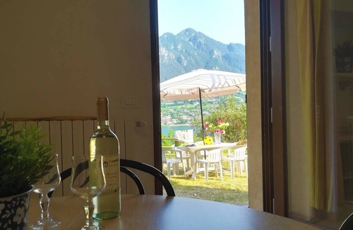 Idro Condo | Lake shore with garden