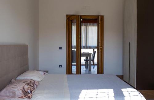Piazza-Tralia-Pendolo House | Madre Terra