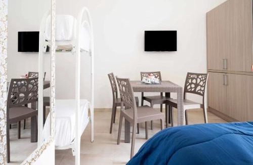 Boncore House | Monolocale Vela Nuovo con Wi-Fi, Clima e Giardino a Torre Lapillo