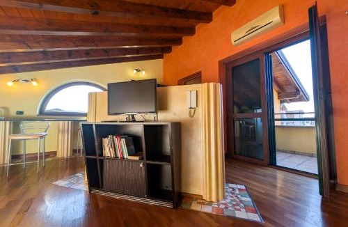 Saronno Apartment | Openspace Attic Apartment with terrace, Wi-Fi