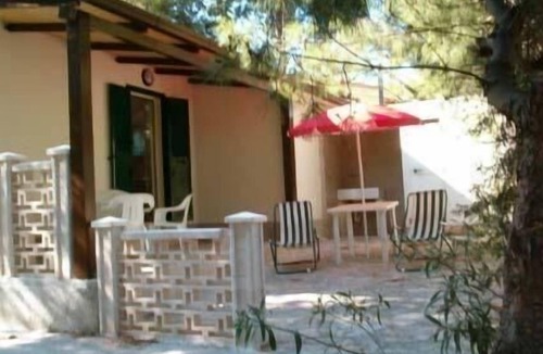 Defensola House | Orchid holiday flat with covered veranda