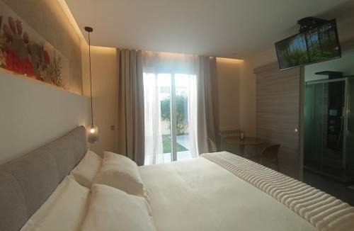 Ragusa House | SOTTOVOCE Camera con giardino privato ingresso indipendente
