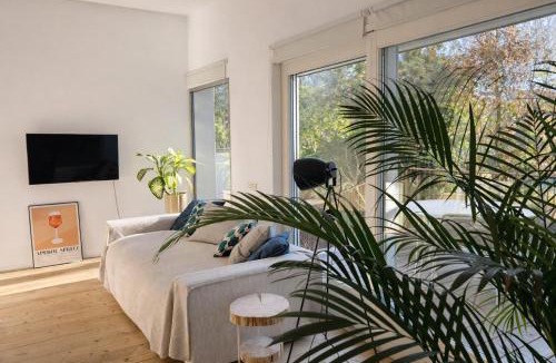 Treviso Apartment | STUDIO 14 - apt design con terrazza sul fiume - 2 biciclette incluse - vicino al centro