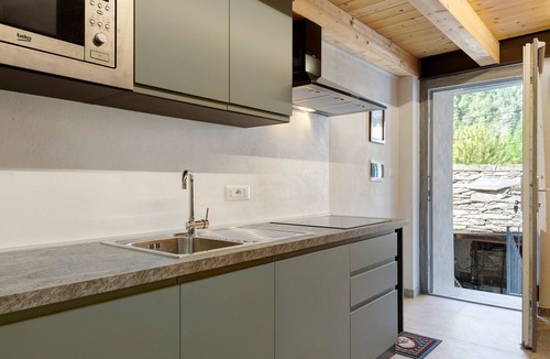 Morgex Apartment | Studio with Private Parking, Shared Garden, and Walk-in Closet