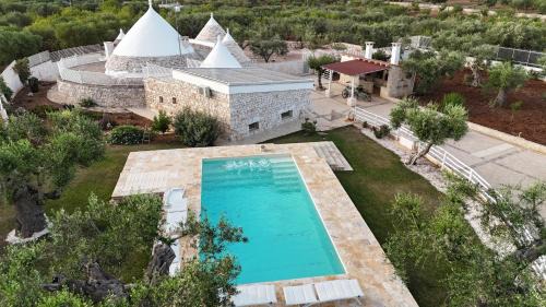 Castellana Grotte Apartment | Trulli Lisanna - Luxury Trulli Estate with Pool