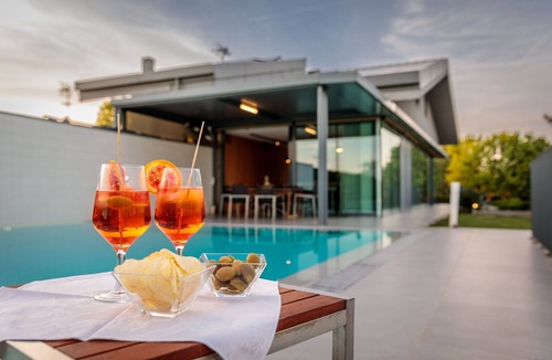 Arzergrande Villa | Wonderful private villa with hot tub, sauna, A/C, private pool, WIFI, TV, patio and pets allowed