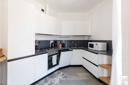 Bellano Apartment | Your Lake Como adventure begins here. Every sunset from the terrace, every laugh shared in the outdoor dining area, every hike on the surrounding trails will become part of your personal story. This air-conditioned apartment features two bedrooms with a