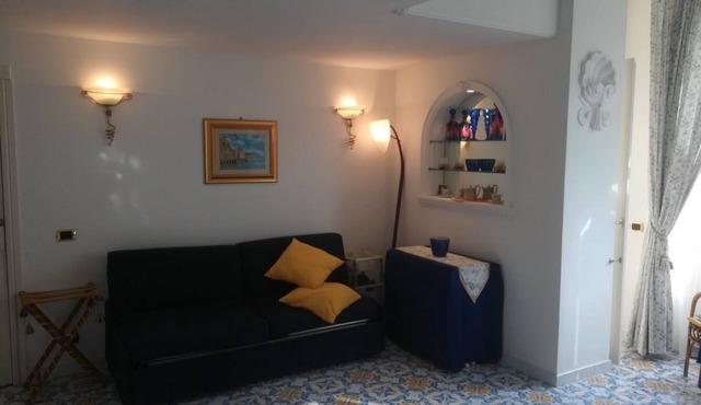 A lovely apartment on the most elegant street of the Blue Island.