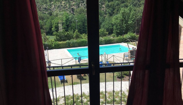 Apartment 2 bedrooms, 1 bathroom and living room with kitchenette and swimming pool