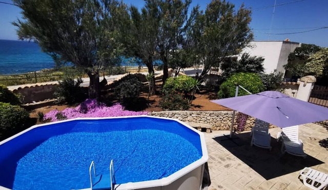 Emma's Beachfront Villa with pool, by Apulia home