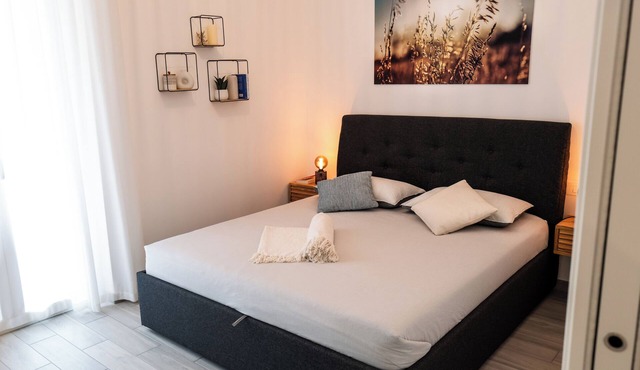 Modern apartment with sea view, top amenities and private parking space