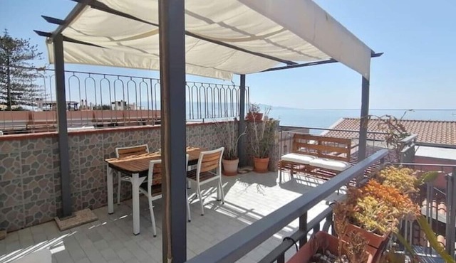 Seafront, attic room with terrace.