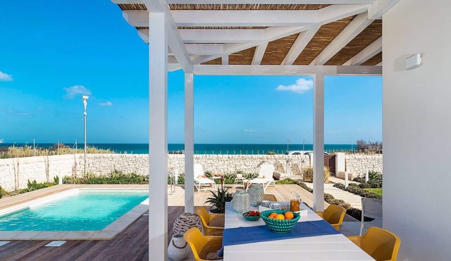 Three villas next to each other, sea front with private pools