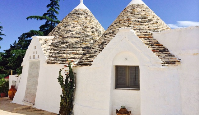 Trulli in historic farmhouse in panoramic position between sea and hills