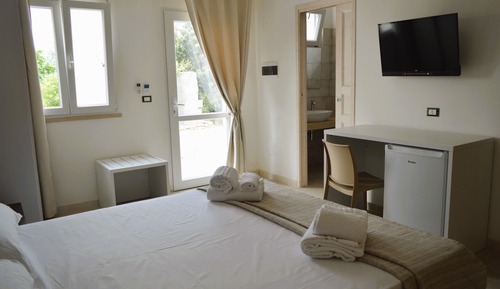 Junior Quadruple Room, Garden View