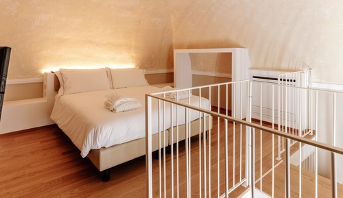 Suite con balcone e soppalco